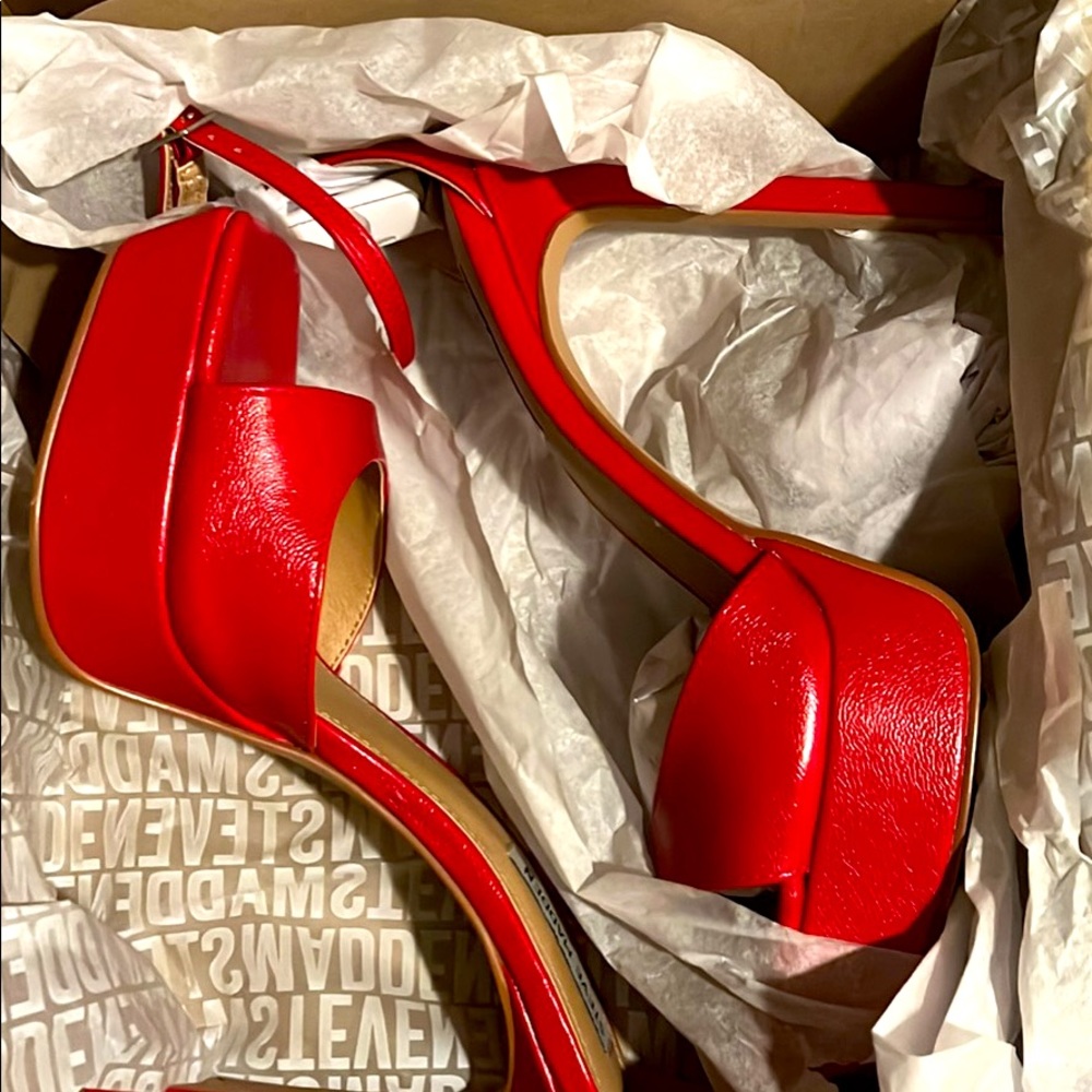 SCORCH RED — a flirty new extra-high heel, dainty ankle strap and airy open toe.